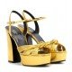 Gucci Metallic leather platform sandals Gold