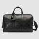 GG print embossed travel bag